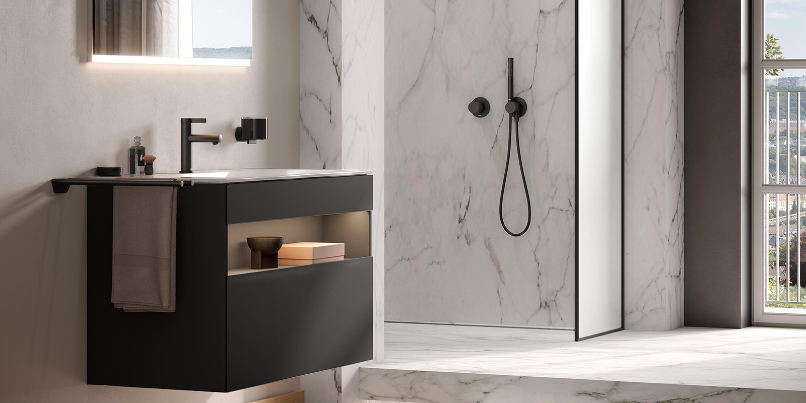 Ein modernes Badezimmer mit einem eleganten schwarzen Waschbecken und einer stilvollen Dusche aus Glas und Marmor.